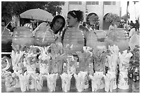 Cups of fresh fruits offered for sale on the street. Guadalajara, Jalisco, Mexico ( black and white)