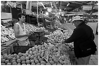 Fruit vending in Mercado Libertad. Guadalajara, Jalisco, Mexico (black and white)