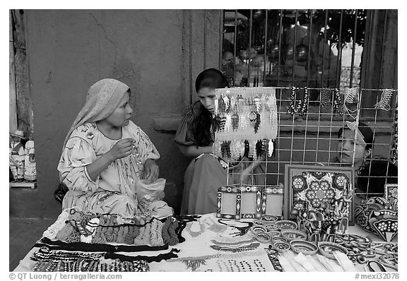 Huichol women selling crafts on the street, Tlaquepaque. Jalisco, Mexico