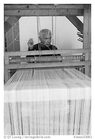 Man operating a weaving machine, Tlaquepaque. Jalisco, Mexico (black and white)