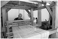 Weaver operating a traditional machine, Tlaquepaque. Jalisco, Mexico (black and white)