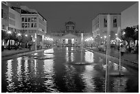 Plaza Tapatia at night with Hospicio Cabanas reflected in basin. Guadalajara, Jalisco, Mexico ( black and white)