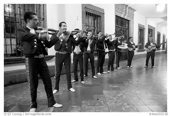 Band of mariachi musicians at night, Tlaquepaque. Jalisco, Mexico (black and white)