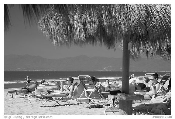 People lying on beach chairs, Nuevo Vallarta, Nayarit. Jalisco, Mexico