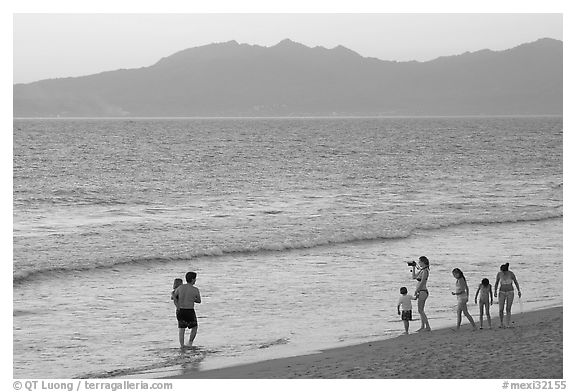 Family on the beach at sunset, Nuevo Vallarta, Nayarit. Jalisco, Mexico