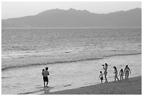 Family on the beach at sunset, Nuevo Vallarta, Nayarit. Jalisco, Mexico (black and white)