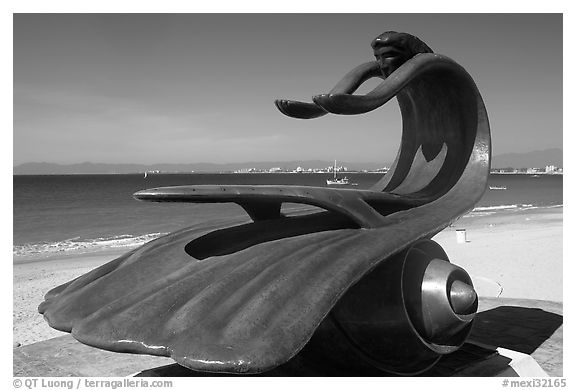 Sculpture by Bustamante on the seaside walkway with beach in the background, Puerto Vallarta, Jalisco. Jalisco, Mexico (black and white)