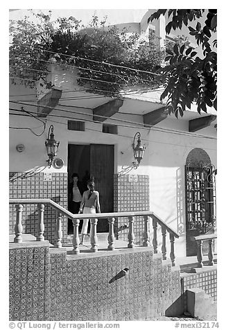 Women at the door of a house, Puerto Vallarta, Jalisco. Jalisco, Mexico (black and white)