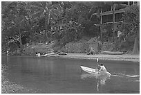 Woman using a canoe in a village,  Boca de Tomatlan, Jalisco. Jalisco, Mexico ( black and white)