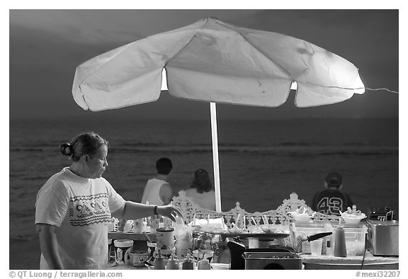 Food vendor on the Malecon at night, Puerto Vallarta, Jalisco. Jalisco, Mexico (black and white)