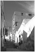 Man walking down stairs of Cajaon de Garcia Rojas. Zacatecas, Mexico ( black and white)