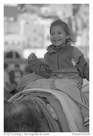 Girl riding a donkey. Guanajuato, Mexico (black and white)