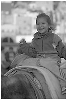 Girl riding a donkey. Guanajuato, Mexico (black and white)