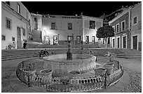 Fountain on Plazuela de los Angeles at night. Guanajuato, Mexico (black and white)