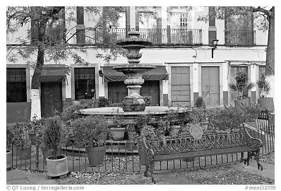 Fountain and public bench on Plazuela San Fernando. Guanajuato, Mexico