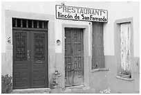 Closed doors of restaurant  Plazuela San Fernando. Guanajuato, Mexico (black and white)