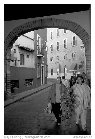 Women walking in a tunnel. Guanajuato, Mexico