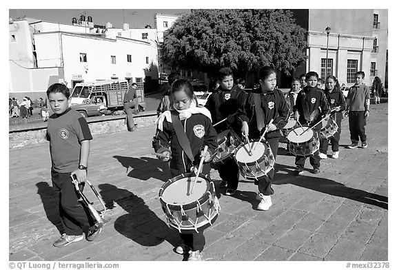 Schoolchildren in a marching band. Guanajuato, Mexico (black and white)