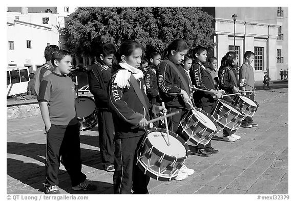 Children practising in a marching band. Guanajuato, Mexico (black and white)