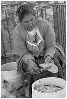 Woman peeling cactus. Guanajuato, Mexico (black and white)