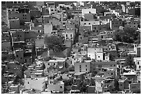 Brligly painted houses on hillside. Guanajuato, Mexico (black and white)