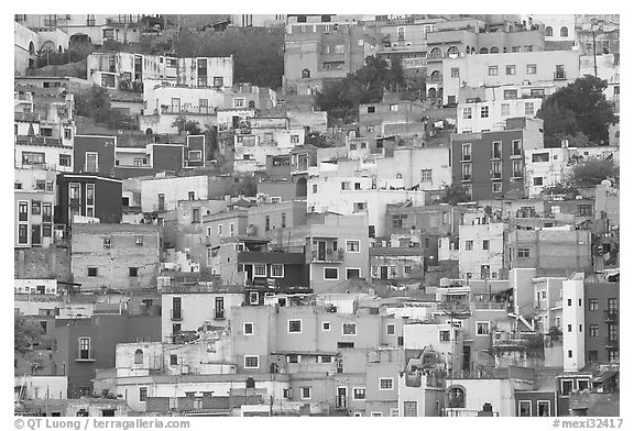 Steep hill with multicolored houses. Guanajuato, Mexico (black and white)
