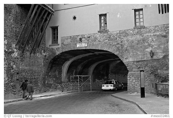 Entrance of one of the subterranean streets with a house built above. Guanajuato, Mexico (black and white)