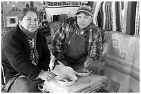 Couple eating in the street. Guanajuato, Mexico (black and white)