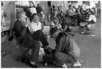 Shoe shinning on plazza. Guanajuato, Mexico ( black and white)