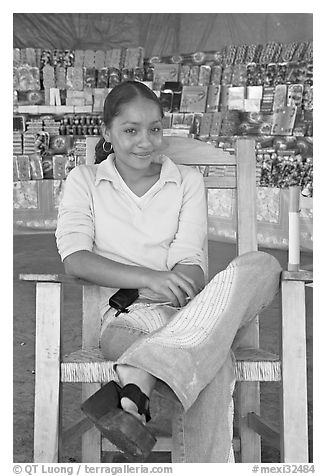 Woman in a fruit stand. Mexico