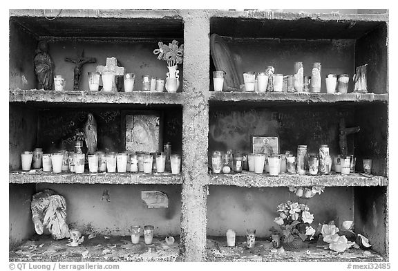 Candles in a roadside chapel. Mexico (black and white)