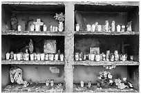 Candles in a roadside chapel. Mexico (black and white)