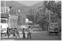 Children playing with a ball in village street. Mexico (black and white)