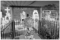 Covered tomb in a cemetery. Mexico (black and white)