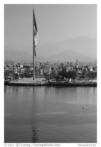 Largest Mexican flag sagging in early morning, Ensenada. Baja California, Mexico