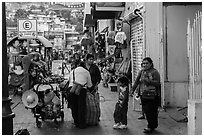 Women packing souvenirs for sale, Ensenada. Baja California, Mexico ( black and white)