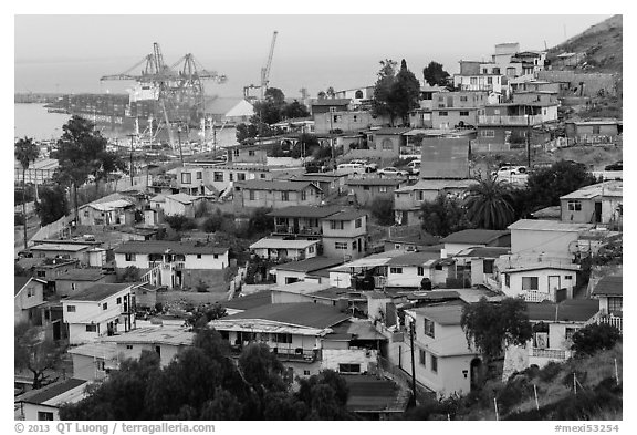 Houses on hillside above harbor, Ensenada. Baja California, Mexico (black and white)