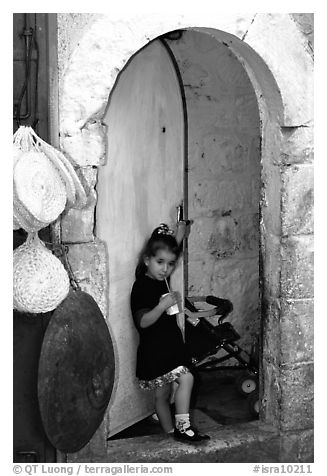Girl in a doorway. Jerusalem, Israel (black and white)