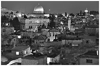 Old town roofs and Dome of the Rock by night. Jerusalem, Israel (black and white)