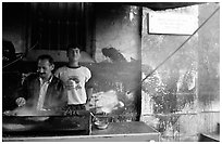 Food vendor broiling meat. Jerusalem, Israel ( black and white)