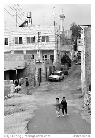 Two schoolchildren in a street of East Jerusalem. Jerusalem, Israel
