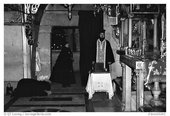 Worshiping inside the Church of the Holy Sepulchre. Jerusalem, Israel