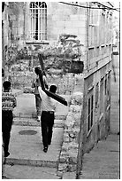 Men carrying crosses. Jerusalem, Israel (black and white)