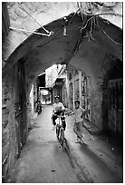 Two children under an archway, Hebron. West Bank, Occupied Territories (Israel) ( black and white)