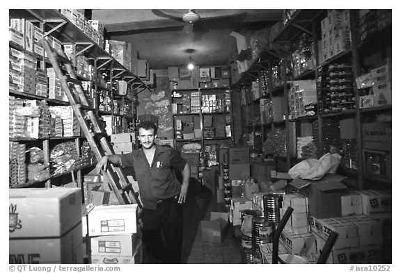 Man in a store, Hebron. West Bank, Occupied Territories (Israel)