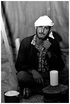Bedouin man in a tent, Judean Desert. West Bank, Occupied Territories (Israel) (black and white)