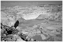 Shallow pond and colored rocks, near Mitzpe Ramon. Negev Desert, Israel ( black and white)