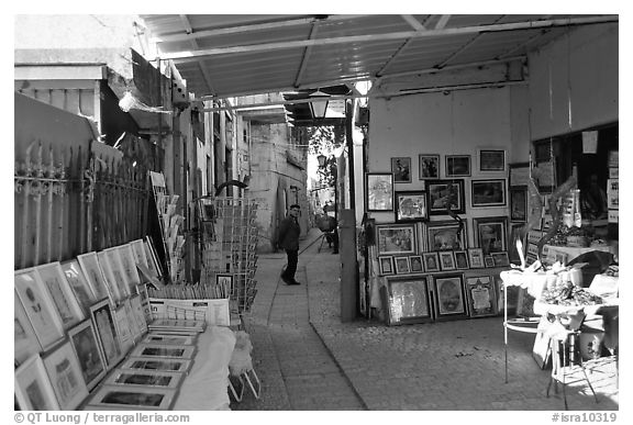 Paintings in Artist's shop, Artist Quarter, Safed (Zefad). Israel (black and white)