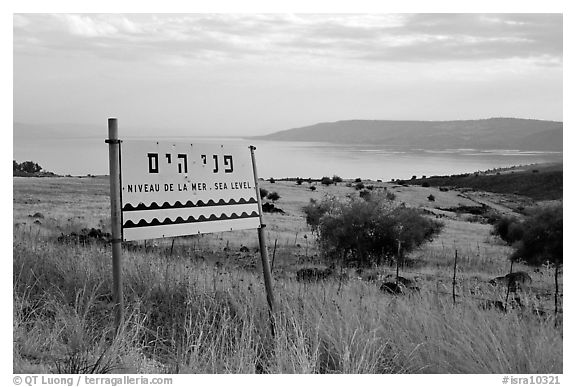 Sign marking sea level and the Lake Tiberias. Israel (black and white)