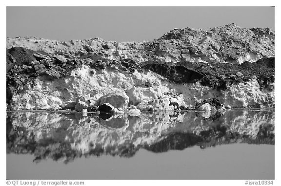 Salt formations reflected in the Dead Sea. Israel (black and white)